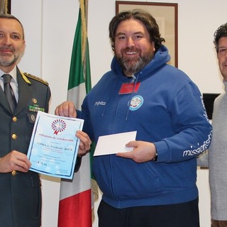 Da sn il Comandante Bia, il vicepresidente Nicolotti e il componente del direttivo di Missione Sorriso Piercarlo Lunardi